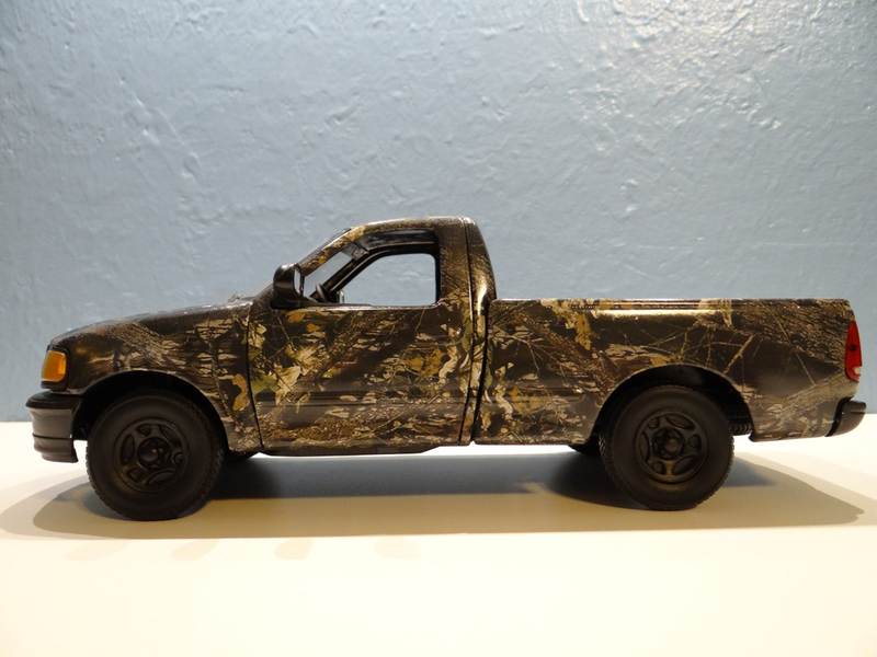 Illustration for article titled 1:18 Scale Camo F-150 by ERTL My first Live and Let Diecast! Review!
